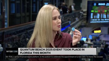 Mastronardi of the NYSE holding up her “qubit” on air during a segment highlighting Quantum Beach 2025