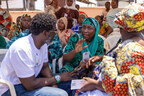 Kevin Okyere interacting with community members during the Foundation World Food Day Outreach