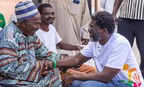 Kevin Okyere interacting with community members during the Foundation World Food Day Outreach