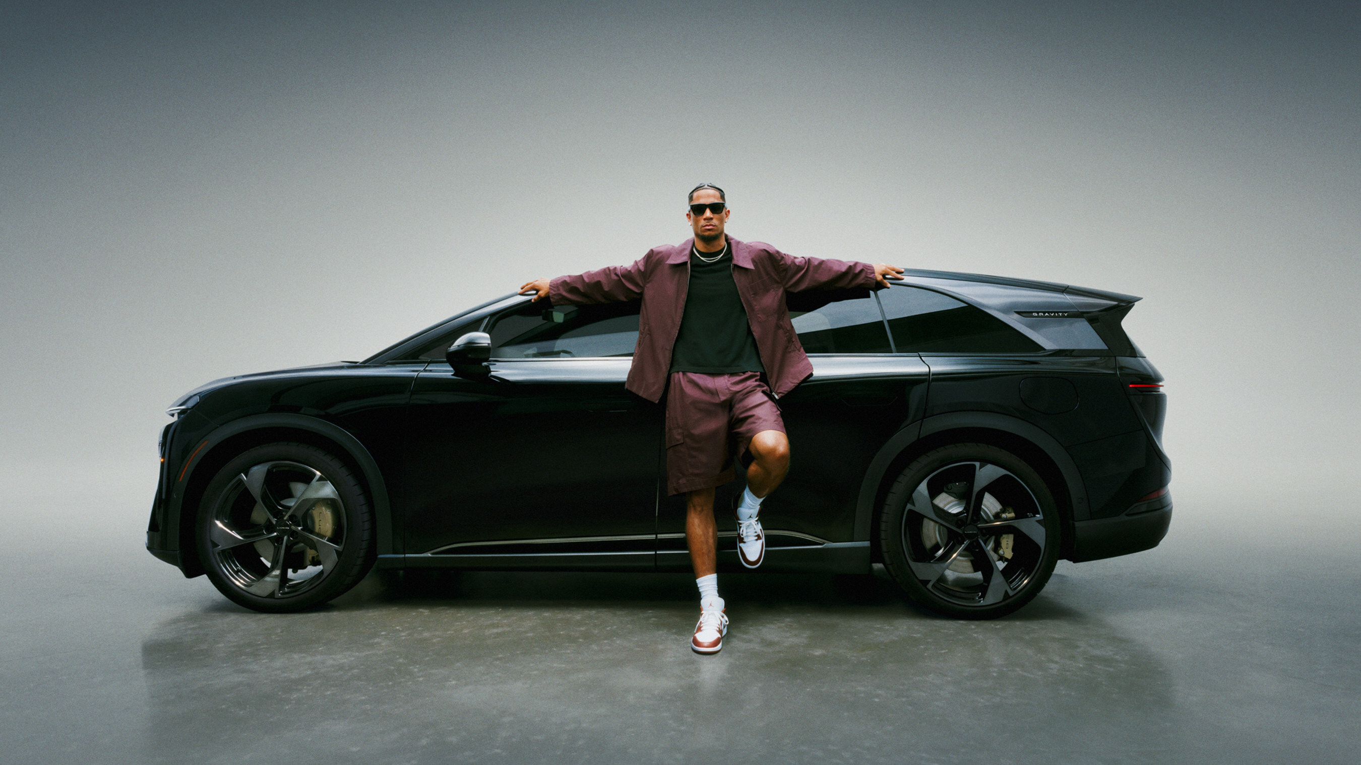 Josh Hart of the New York Knicks poses alongside the Lucid Gravity SUV as part of the company’s latest marketing campaign celebrating those who refuse to settle for the status quo.
Photo by Jason McDonald