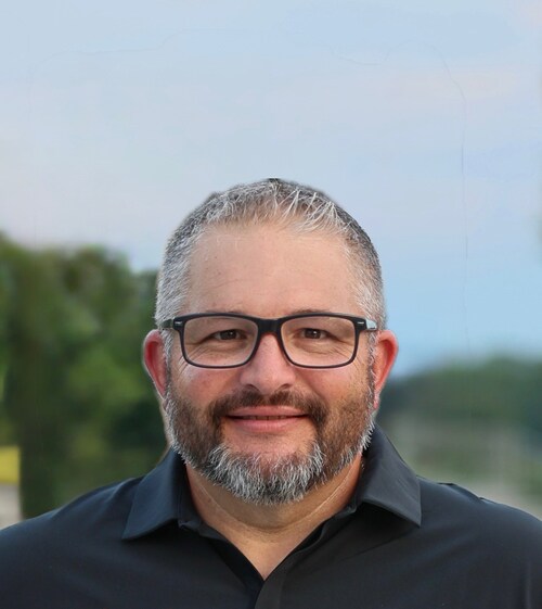 A headshot of ARCH Cutting Tool's new Chief Revenue Officer, Shane Hollenbaugh.