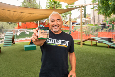 Cesar Millan showcasing the Happy-Go-Lucky Belly formula at his Dog
Psychology Center. Photo courtesy of Better Dog Supplements.