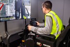 An operator uses the Cat® Simulators Next Generation Excavator system to learn how to operate Cat® Technology systems.