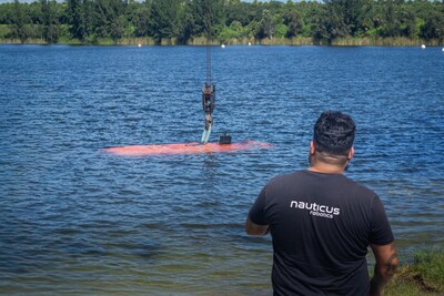 Aquanaut lowering into the water to begin its final checks under the watchful eye of a Nauticus operator. Crane launch operations are still required until the launch-from-shore operations currently under development are implemented lakeside.