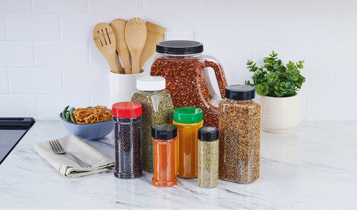 A variety of Flexcraft jars and PET bottles in a kitchen, showcasing ready-to-ship stock packaging.