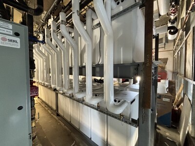 Central thermal storage system: 24 pairs of Thermino units working together to deliver scalable, efficient hot water and peak demand management for a large building. Central thermal storage system: 24 pairs of Thermino units working together to deliver scalable, efficient hot water and peak demand management for a large building.