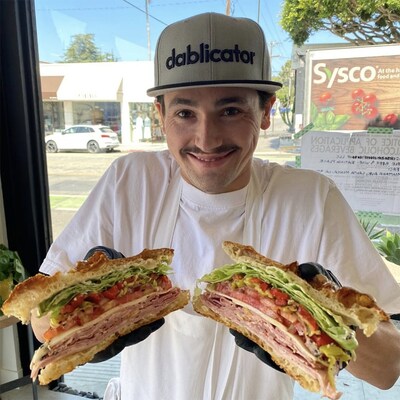 Our Manager Jasper Holding A Combo Grinder