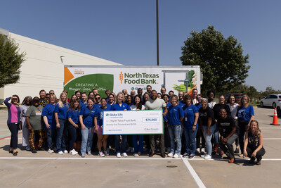 Globe Life employees present a check to North Texas Food Bank, sponsoring a Produce Pod. Globe Life employees present a check to North Texas Food Bank, sponsoring a Produce Pod.