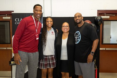 (l to r)  Former Minnesota Timberwolves teammate Ervin Johnson, Lauren Hassell (daughter), Tiffany Hassell (wife) and Coach Trenton Hassell celebrate his recognition as National Coach of the Year from the National Christian School Association. (l to r)  Former Minnesota Timberwolves teammate Ervin Johnson, Lauren Hassell (daughter), Tiffany Hassell (wife) and Coach Trenton Hassell celebrate his recognition as National Coach of the Year from the National Christian School Association.
