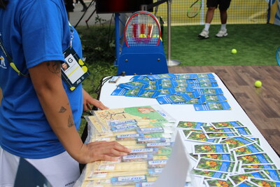 Seed packets to help pollinators distributed at the National Bank Open. (CNW Group/407 ETR Concession Company Limited)