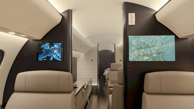 Bulkhead-mounted display screens showing digital art and moving maps, connected via the AeroPuck™