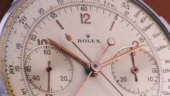 Detail of the silvered dial attributed to Beyeler workshops, displaying the dual tachymetre and telemeter scales with applied white-gold indexes
