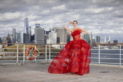 Framed by the iconic Manhattan skyline, Coco Rocha wears a signature Christian Siriano design aboard Queen Mary 2 (credit: Chris Ison).