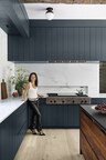 Designer Amy Hirsch in the award-winning kitchen that earned her a national Luxe Magazine Design Icon award.