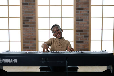 Student playing the piano
