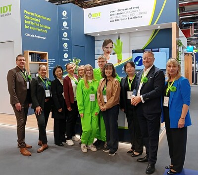 Sally Choe, Co-CEO of IDT Biologika (fourth from right), poses for a commemorative photo with key company representatives in front of the company’s booth at the CPHI event.