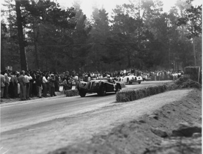 In his Jaguar XK120, Phil Hill races to a win in the first Pebble Beach Cup, the premier event in the first Pebble Beach Road Race, held on November 4, 1950. (Photo: Julian P. Graham / Pebble Beach Company Lagorio Archives)