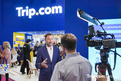Mr Andy Washington, General Manager for Europe, is taking interviews at the Trip.com Group booth Mr Andy Washington, General Manager for Europe, is taking interviews at the Trip.com Group booth