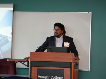 Bilal Siddique gives a presentation on bridging the gap between engineering and management.