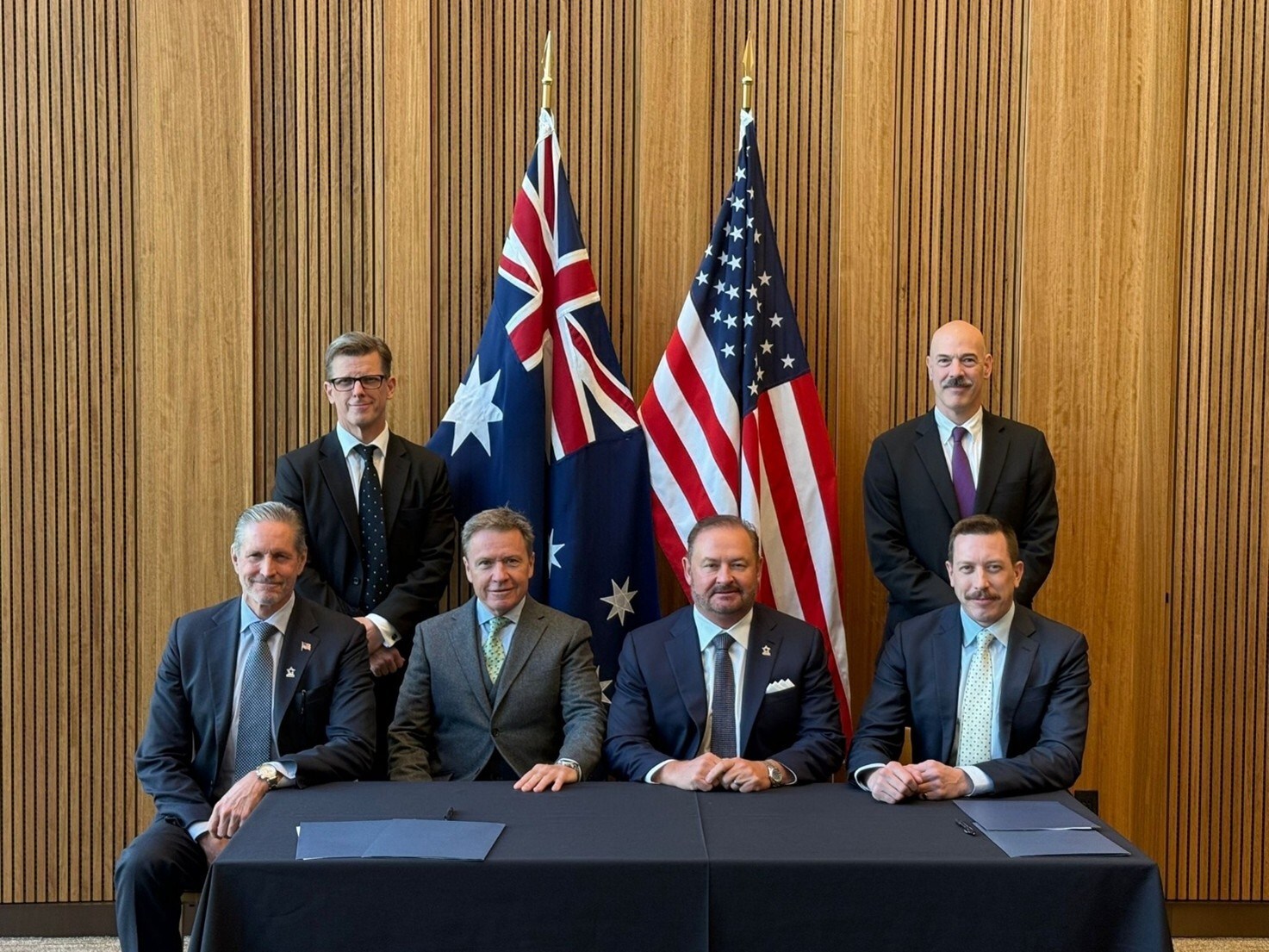 Back left to right, Mr. Jason Robertson (Deputy Head of Mission and Ambassador to the Organization of American States, Australian Government) and Mr. Seth Bailey (Deputy Assistant Secretary, Bureau of East Asian and Pacific Affairs, U.S. Government). Front left to right, Mr. Michael R. Hollomon II (USSM Chief Commercial Officer), Mr. Brett Lynch (IonicRE Executive Chairman), Mr. Stacy W. Hastie (USSM Co-founder & CEO), and Mr. James Durrant (RareX Limited Managing Director).
