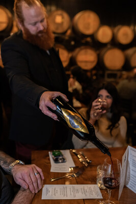 Head Winemaker Matt Check pours Cellar Beast's flagship wine for New Year's Eve Eve Pairing Dinner