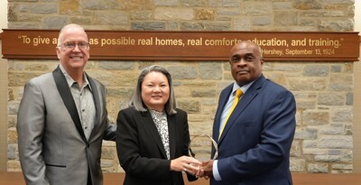 Peter G. Gurt '85, Milton Hershey School President; Maria Kraus '89, Chairman of the MHS Board of Managers; James Turner, MHS Middle Division Associate Director of Home Life and President of the CORE Board of Directors.