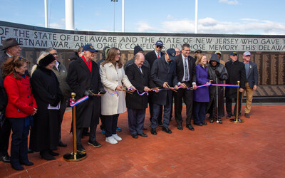 Dignitaries gather to the officially cut the ribbon on the new Wall of Remembrance. Dignitaries gather to the officially cut the ribbon on the new Wall of Remembrance.