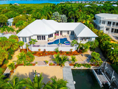 Sited on an elevated lot and built upon solid concrete pilings, the residence offers 3,952 sf of interiors on one living level, with 5 bedrooms (plus a convertible 6th), 4 full and 2 half-baths. Other features include a chef’s kitchen, custom pool and spa, outdoor bar and a large backyard. FloridaKeysLuxuryAuction.com.