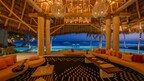 Elegant oceanfront living room in a Punta Mita beachfront villa with five-star amenities.