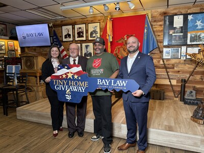 The Bayramoglu Family and Bay Law Injury Attorneys gives their first student-built tiny home to US Air Force Veteran Edwin Santiago-Colon during the Veterans Day Celebration at the Leatherneck Club in Las Vegas, NV.
