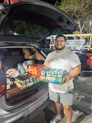 Eightpoint team member Richard Olive helps prepare and pack essential supplies bound for Jamaica as part of Hurricane Melissa relief efforts.