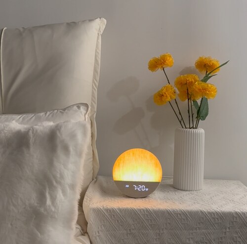 A warm winter bedroom setup featuring the Dreamegg Sunrise Alarm Clock — capturing the cozy, light-filled atmosphere the series brings to early mornings.