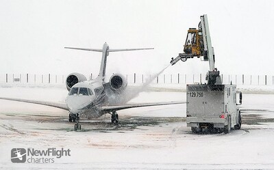 Private jet de-icing at Jackson Hole Airport Private jet de-icing at Jackson Hole Airport