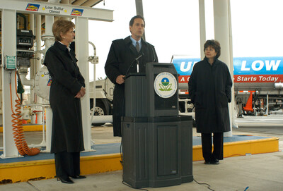 Steven Levy, Managing Director at Sprague Energy, delivers remarks during the April 2003 launch of Ultra-Low Sulfur Diesel (ULSD) at the Sunoco station in Newark. Pictured with Levy are former New Jersey Governor Christine Todd Whitman, who served as Administrator of the U.S. Environmental Protection Agency (EPA) during the introduction of ULSD (left), and Jane M. Kenny, former EPA Region 2 Administrator (right). Sprague helped commercialize ULSD 10 years ahead of the federal mandate. Steven Levy, Managing Director at Sprague Energy, delivers remarks during the April 2003 launch of Ultra-Low Sulfur Diesel (ULSD) at the Sunoco station in Newark. Pictured with Levy are former New Jersey Governor Christine Todd Whitman, who served as Administrator of the U.S. Environmental Protection Agency (EPA) during the introduction of ULSD (left), and Jane M. Kenny, former EPA Region 2 Administrator (right). Sprague helped commercialize ULSD 10 years ahead of the federal mandate.