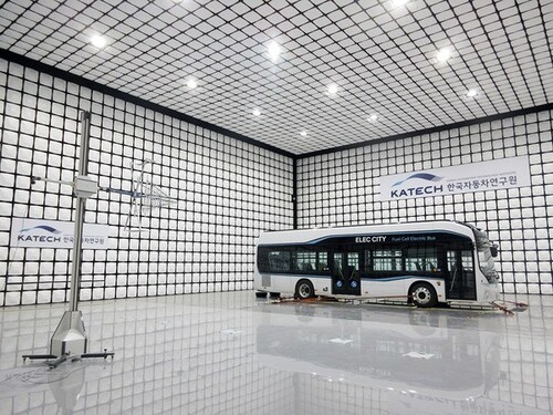 An electric bus undergoes EMC testing inside KATECH’s full-scale anechoic chamber.