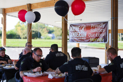 First responders in Dobson, North Carolina, enjoy an appreciation meal sponsored by Wayne-Sanderson Farms as part of the company’s First Responders Initiative.