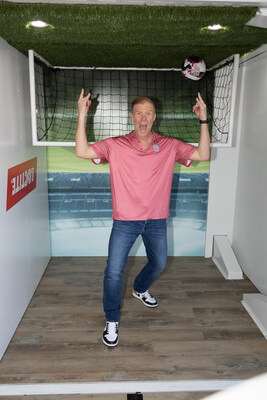 Alexi Lalas posing in front of the Loctite® brand goal.
