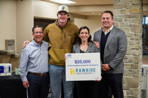 Alan Loux, president and CEO of Rawhide Youth Services; Luke Musgrave, Green Bay Packers tight end; Cindy Stilp, Marketing Communications Director at Essity; and Justin Wolf, Director of Corporate Partnerships Sales & Activations for the Green Bay Packers, at an event celebrating the “Tackle Hygiene with Every Catch” campaign and donation of $25,000 in sustainable hygiene products to Rawhide. Alan Loux, president and CEO of Rawhide Youth Services; Luke Musgrave, Green Bay Packers tight end; Cindy Stilp, Marketing Communications Director at Essity; and Justin Wolf, Director of Corporate Partnerships Sales & Activations for the Green Bay Packers, at an event celebrating the “Tackle Hygiene with Every Catch” campaign and donation of $25,000 in sustainable hygiene products to Rawhide.