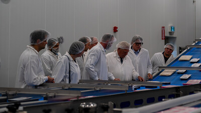 apetito and Heart to Home Meals teams tour expansion of production facility.