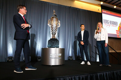 The sterling silver image of Alex Palou is now affixed onto the Borg-Warner Trophy® to commemorate his victory in the 2025 Indianapolis 500, unveiled during a ceremony in downtown Indianapolis on November 19, 2025. Pictured: Doug Boles, Palou and Michelle Collins.