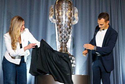 The sterling silver image of Alex Palou is now affixed onto the Borg-Warner Trophy® to commemorate his victory in the 2025 Indianapolis 500, unveiled during a ceremony in downtown Indianapolis on November 19, 2025. BorgWarner's Michelle Collins unveils the base of the trophy.