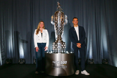 The sterling silver image of Alex Palou is now affixed onto the Borg-Warner Trophy® to commemorate his victory in the 2025 Indianapolis 500, unveiled during a ceremony in downtown Indianapolis on November 19, 2025. Pictured: Michelle Collins and Palou