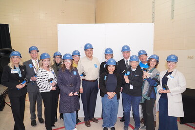 Eliana Rodriguez, a 10-year member of the Carpentersville-based Boys & Girls Clubs of the Northwest Suburbs (BGCNWS) and the current Youth of the Year (center), joins BGCNWS CEO Amanda Schleede (behind Rodriguez), along with local dignitaries and community members as they await the ceremonial wall-breaking to launch the Woodlands Impact Center renovation. Eliana Rodriguez, a 10-year member of the Carpentersville-based Boys & Girls Clubs of the Northwest Suburbs (BGCNWS) and the current Youth of the Year (center), joins BGCNWS CEO Amanda Schleede (behind Rodriguez), along with local dignitaries and community members as they await the ceremonial wall-breaking to launch the Woodlands Impact Center renovation.