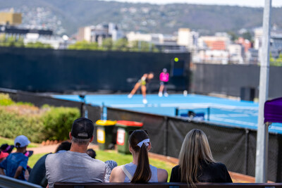 crowds watching a tennis match by william