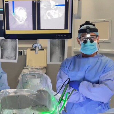 Spine surgeon Dr. Christopher Good in the operating room at HCA Reston Hospital Center to perform the world's first robotic minimally invasive Bertolotti resection surgery.
