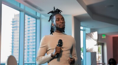 Malik Mbaye, founder and CEO, delivering keynote speech