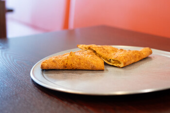 Lenzini_s Pizza_Japanese Curry Calzone