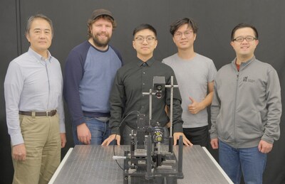 From left to right: Tsuneyuki Ozaki (Professor at INRS), Patrick Kilcullen (Postdoctoral Fellow in the laboratories of Professors Liang and Ozaki), Cheng Jiang (Postdoctoral Fellow in Professor Liang’s laboratory), Yingming Lai (Postdoctoral Fellow in Professor Liang’s laboratory) and Jinyang Liang (Professor at INRS) in front of the SPIRIT technology.
Photo credit: Cheng Jiang, INRS (CNW Group/Institut National de la recherche scientifique (INRS))
