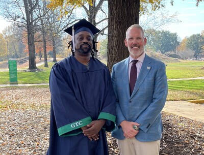 Carver Blassingame with President Larry Miller