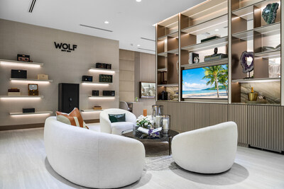 The lounge area featuring an expansive WOLF 1834 wall
